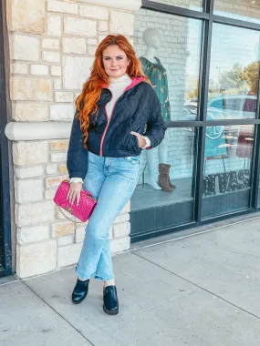 Black lightweight jacket with hot pink inside